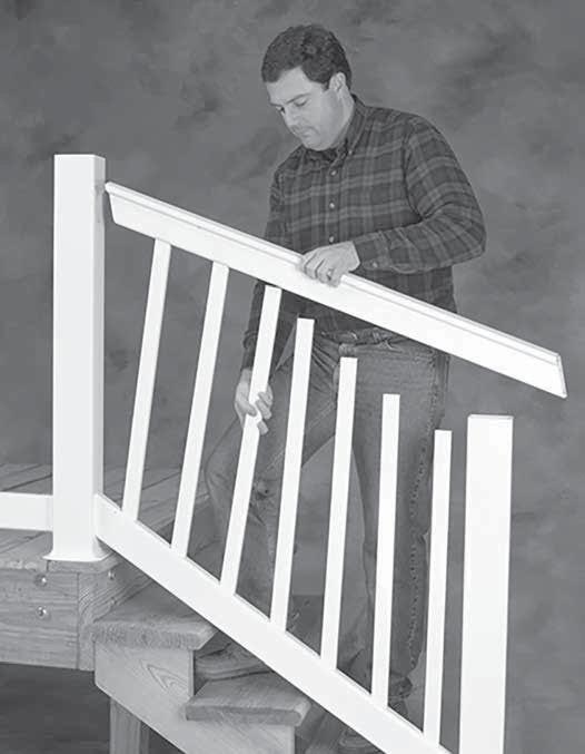 You may find it easier to lift the lower post, insert the bottom rail, and then lower the