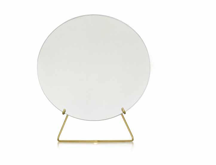 MIRROR STANDING b y M O E B E STANDING MIRROR is a frame-less free standing mirror held by a lightweight metal wire form.
