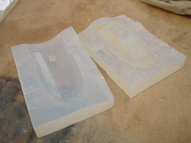 Step 4 The mould halves are cut open and the master pattern removed. Note the irregular pattern used for the split line.