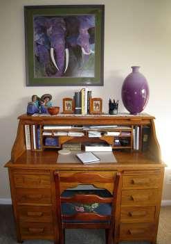 desk is a generally wooded piece of furniture with one or more drawers/ compartments to store items such as