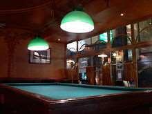 billiard table or billiards table is a bounded table on which billiards-type games are played.
