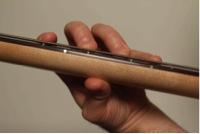 Here is how your thumb and fingers should look from above the neck. Left Hand Fretting Position How you fret with your left hand is going to have a huge impact on your sound.