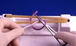 repeated bending may cause these sutures to break. 1 Short purple strand lies freely.