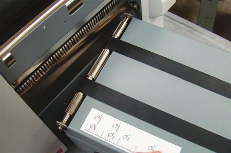 right side of the conveyor with the slot on the machine
