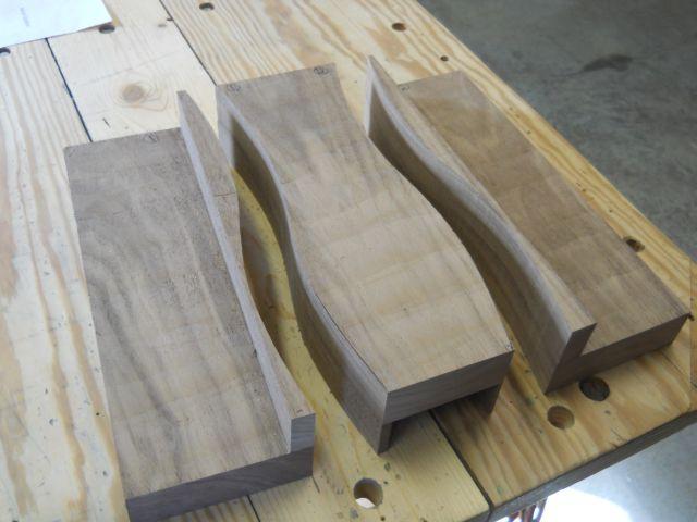 The waste pieces created as a result of cutting the overlapped sections apart are trimmed off in preparation of glue up of the seat blank.