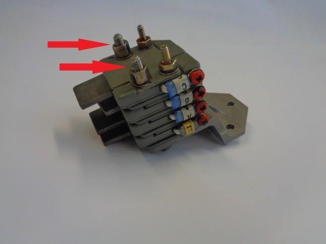 Fig.7 Loose screws and nuts marked with red arrows for disassembly Brush block