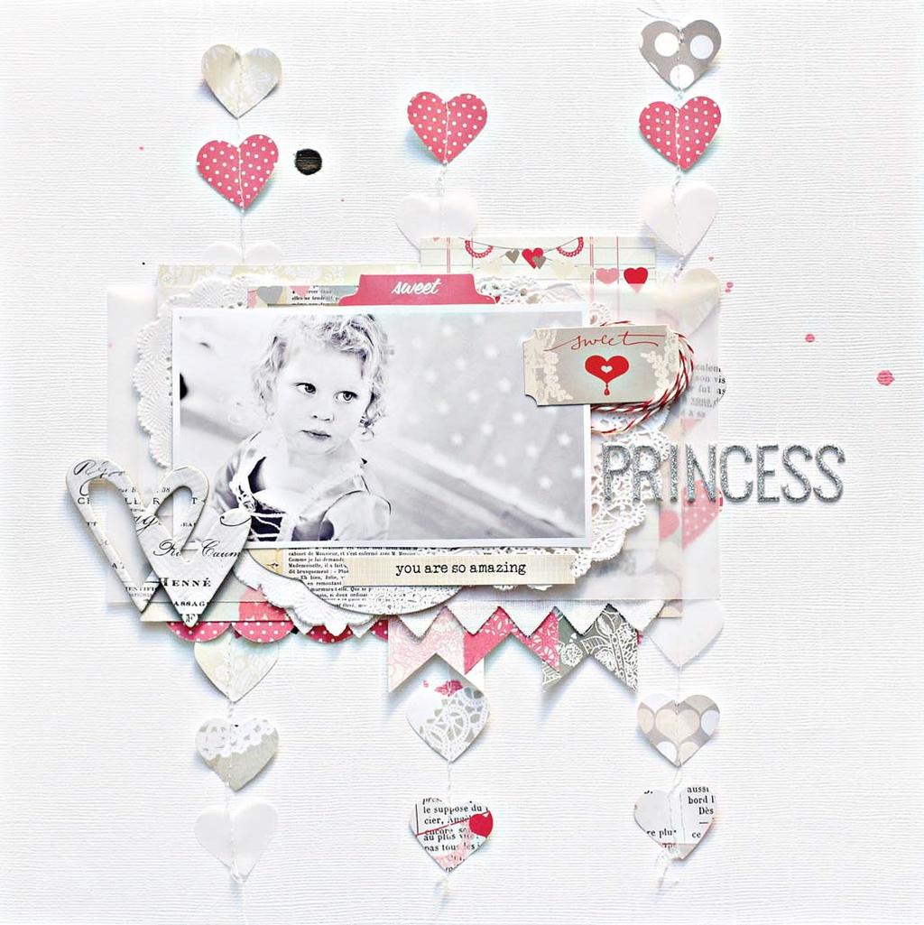 Use a white cardstock for the base of the layout. 2. Add random drops of Color Shine (Primrose and Black Velvet.) 3. Cut out lots of hearts using a punch or Cameo. 4.