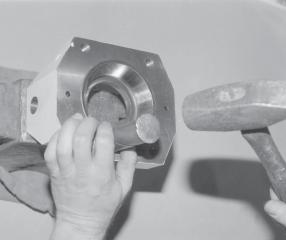31 Reattach marked hammer inlet and return hoses to their respective positions (Fig. 18.