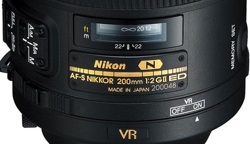 The AF-S NIKKOR 200mm f/2g ED VR II. The Roman numeral indicates it's the second generation of the AF-S 200mm. "Right," he said, "and it features VR II technology." "But how would I know that?