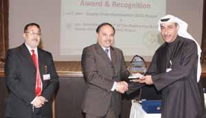 On behalf of KOC C&MD Sami Al-Rushaid, the Manager of Support Services, Waleed Al-Shuaib, received the award from the President of PMI-AGC, Hashim Al-Refai, in recognition of the Company s project -
