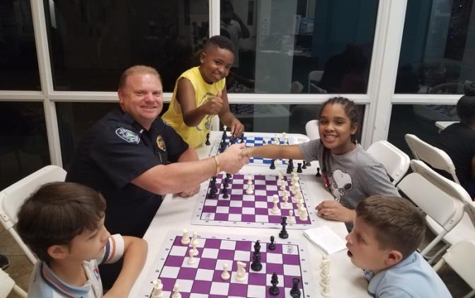 Cardinale visited to play chess one evening, while an off-duty Officer Arroyo