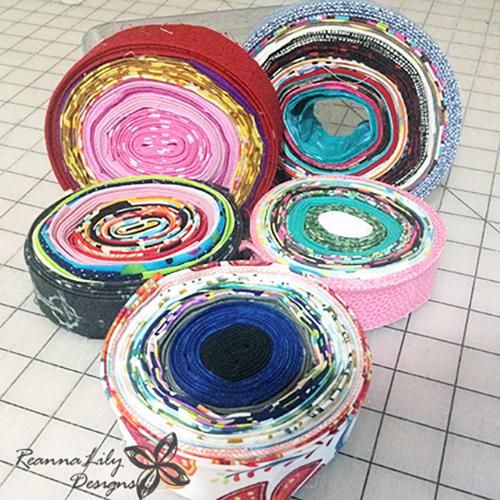 I save my binding in rolls, but only recently realized that I might have enough binding saved to have my own jelly roll quilt race! Seriously.