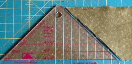 Cut up side of template to make two more Cream triangles. 4.