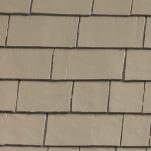 Some examples also have brick or stone cladding, usually toward the bottom half of the exterior walls