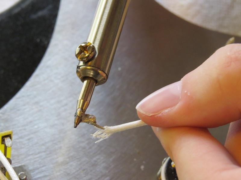 Step 13 Solder the Pickup Wire Coat the tip of your soldering iron with new rosin core solder.