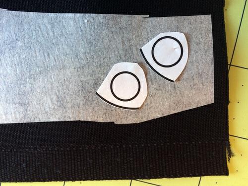 Cut out the inner eye dots and use these as a pattern on the black