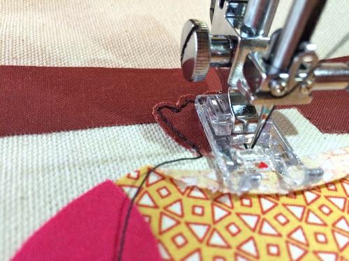 NOTE: Slow and steady is your best bet to get a smooth stitch line. That said, raw edge appliqué is meant to have a more "rustic" look.