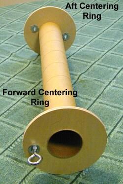 Install a nut / washer on the top side of the centering ring and a washer / nut on the bottom.