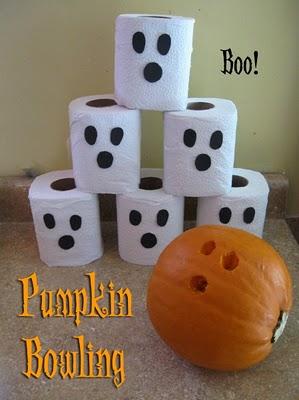 Pumpkin Boo Bowling Toilet paper rolls Black construction paper Double sided tape Scissors Small pumpkin Cut a black construction paper face for each roll of TP Use double sided tape to stick a face