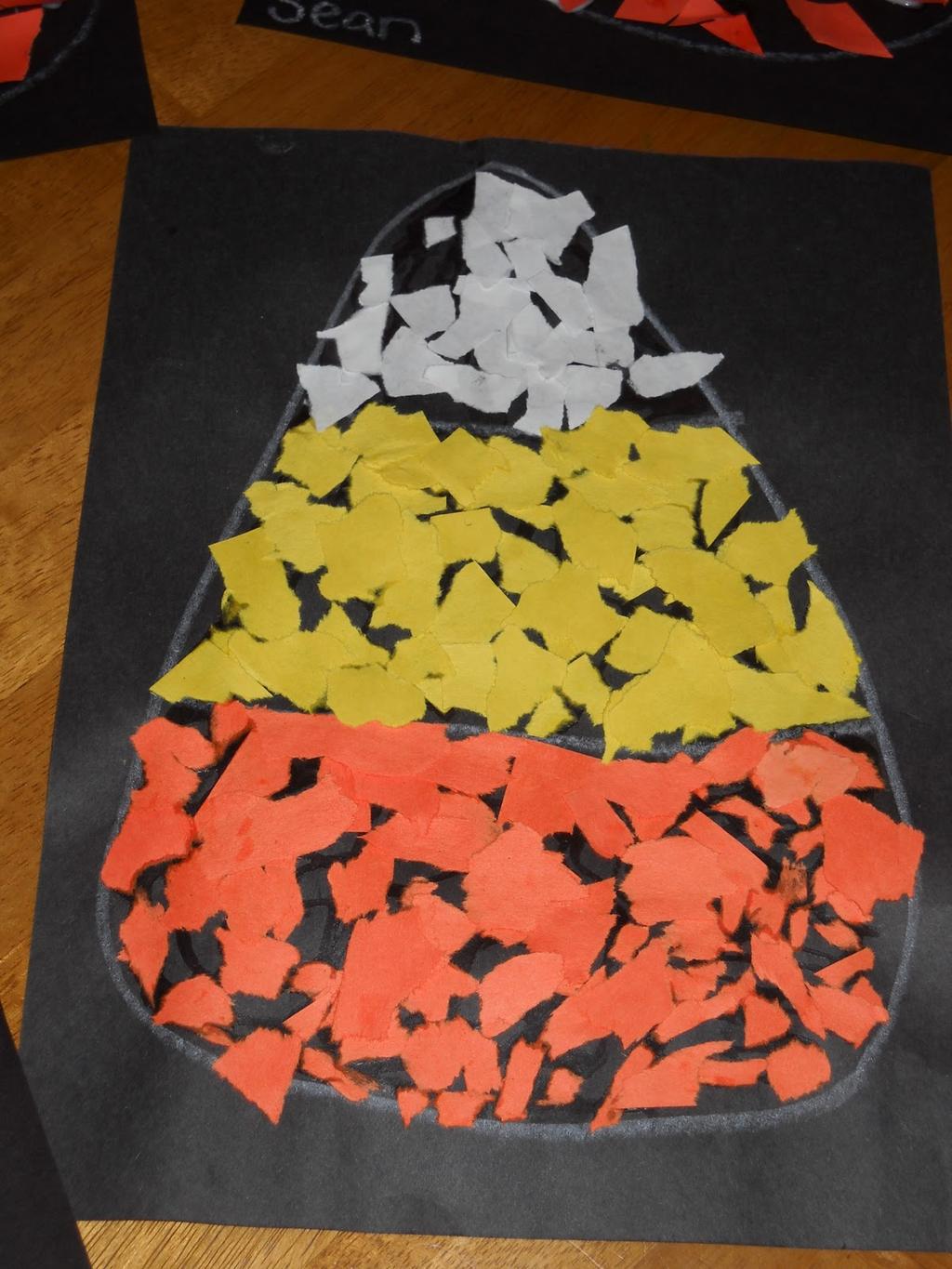 Torn Paper Candy Corn Black, white, orange and yellow construction paper Glue Chalk Use a piece of chalk to draw an outline of a candy corn on a sheet of black construction paper