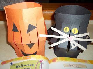 Paper Lantern Kitty Cat Black, white, yellow and pink construction paper Scissors Glue sticks Black crayons Tape Stapler Cut a supply of black construction paper strips to use as handles Cut a supply