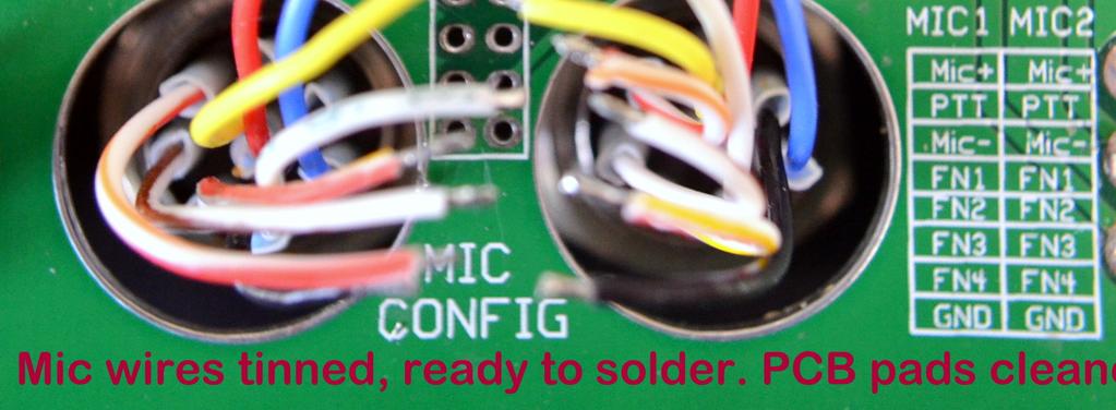Make sure the wires from the mic jacks feed through the cutouts on the PCB, and that the LEDs fit into their mating bezels.
