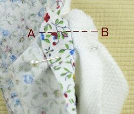 Fold the fabric so that the bottom seam lies