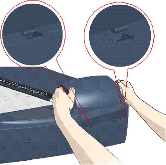 Replace the lamp cover on the scanner - fit the bottom notches in the holes and snap the cover shut. The cover must always be closed before turning scanner power ON.