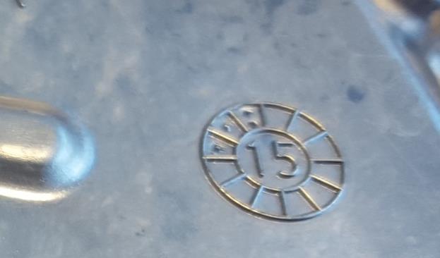 specification. INKJET PRINTING Ink is directly applied to the surface with the use of a gun-body and a microscope nozzle. An example of inkjet marking is shown in Figure 3 on an aluminum slab.