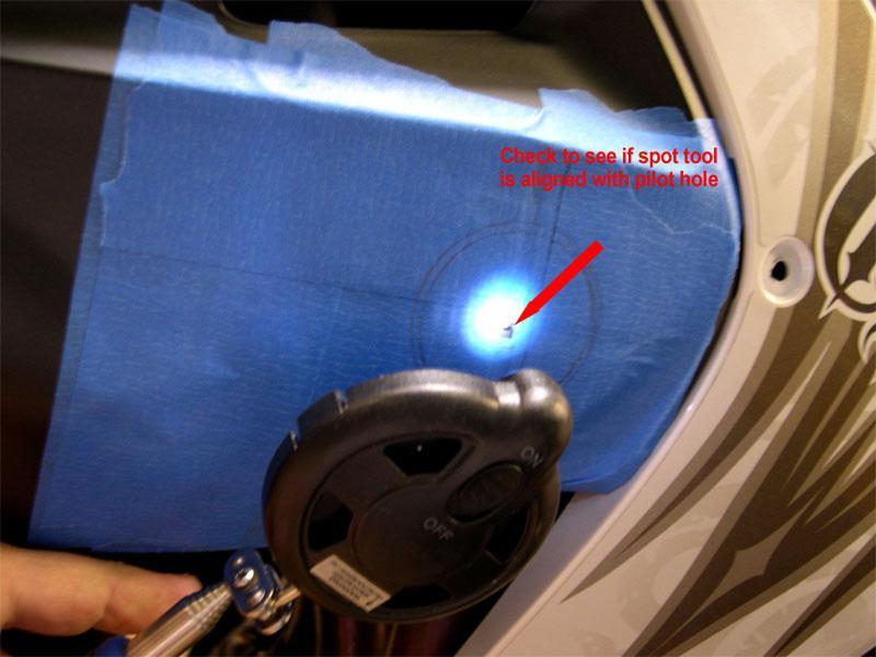 6. Using a small drill 1/8 inch or so drill a pilot hole in the body(see above photo).