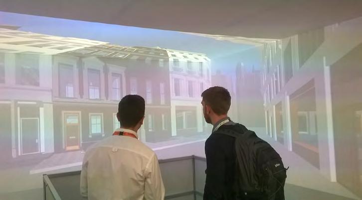 Ultra short throw and short throw projectors installed within a cube to create a 3D virtual reality visualisation for construction projects.