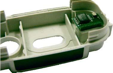 Turn the cartridge cap so that the chip is exposed and use the bevelled cutting tool to remove the OEM chip. This chip is expired and can be discarded.