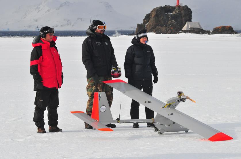 Figure 12: Polish UAV Antarctic Team and their PW-ZOOM (photo Kiell-Sture Johansen) Figure 13: Photogrammetric mission over Chabrier Rock isle in the eastern part of Admiralty Bay in the