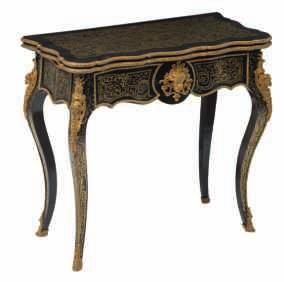 766 A neoclassical veneered cabinet, richly decorated with gilt