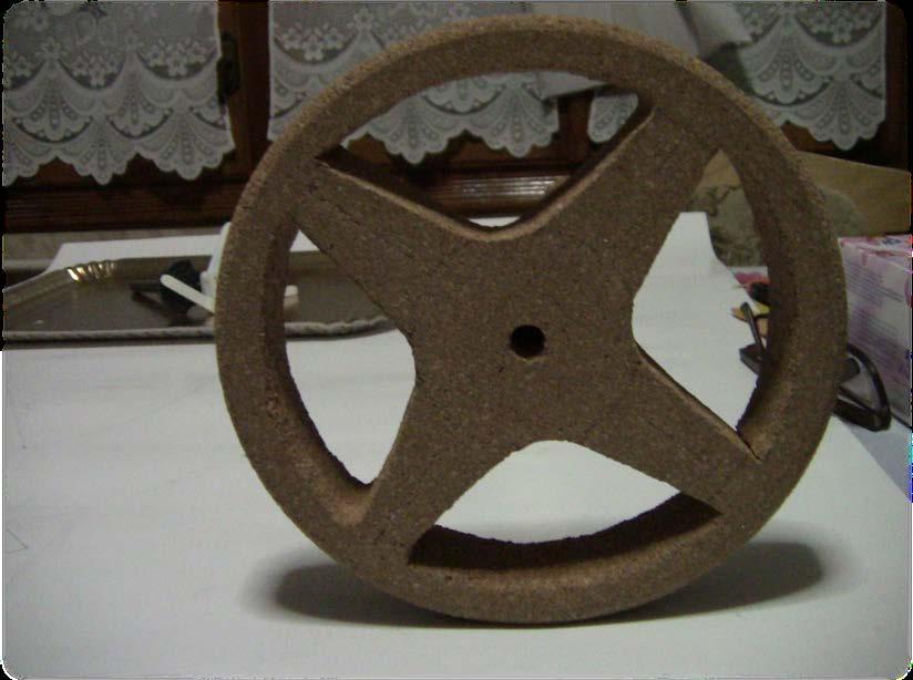The Flywheel For the FLYWHEEL you can use a light weight wood such as linden wood or anything similar. For this version of the project we have used a cork like material which is very light.