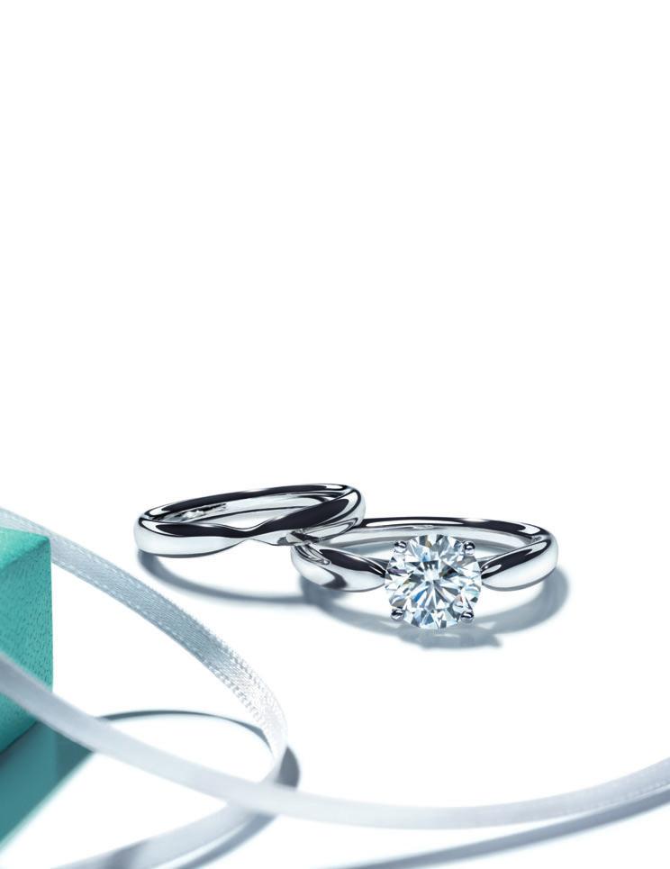 TIFFANY HARMONY Graceful and refined, the tapered shape of Tiffany Harmony embraces the diamond in a
