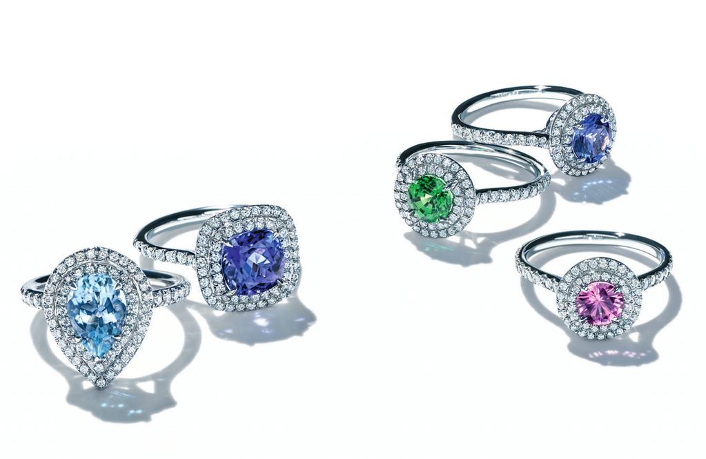 COLORED GEMSTONES Tiffany is famous for our many exquisitely colored gemstone rings. These Tiffany Soleste rings are surrounded with bead-set diamonds that cast a halo of sparkling light.