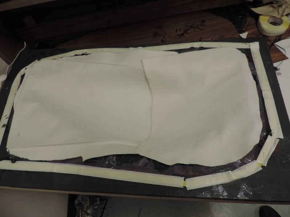 Figure 17: Apply breather cloth and cut off excess material so that it sits inside the