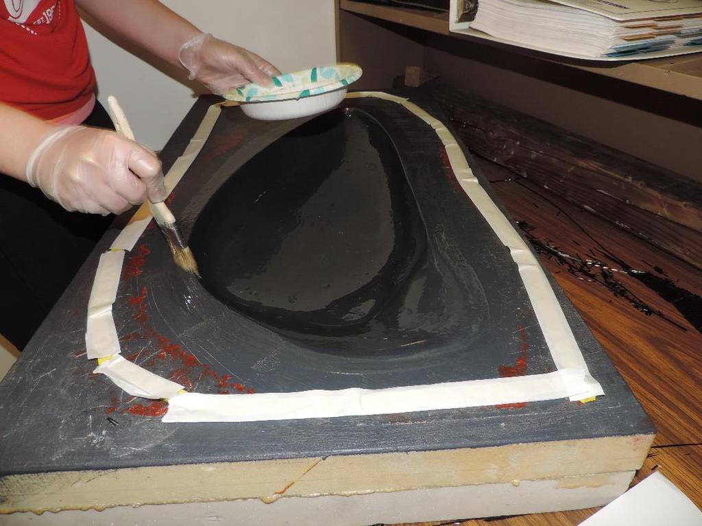 Figure 8: Notice that the resin does not get too close to the tape, but is still applied over the edge (8) Apply the first layer.