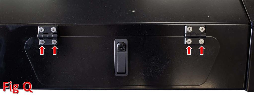 12. On the back side of the latch, there is an adjustment screw.