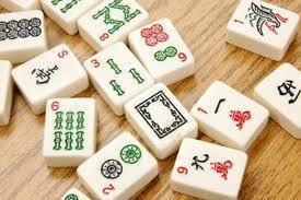 10. THE 16 FLOWER TILES: In the bmerican Variant, the 8 Flower and 8 Season tiles are not placed up on your rack to count towards your score as in the Western game.