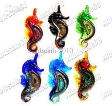 41. Hand-blown burano Glass Seahorse: Set of four with rolled pendant strap so you can wear one as