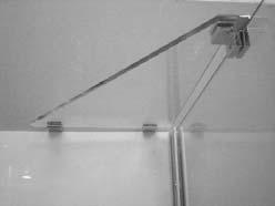 Position the Glass brace bracket to the top of the Take-up panel approximately 0mm in from the glass edge, with the grub screws facing inside the shower.