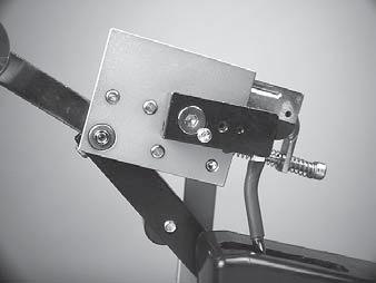 If the brake lever releases before 60 lbs. or after 60 lbs., the tension head should be calibrated as follows.
