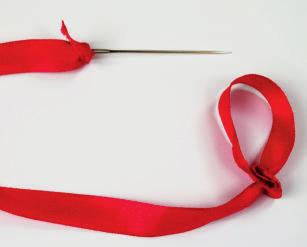 2 Needle lock After threading the ribbon