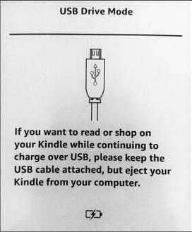 2. Once plugged in, your Kindle will display the below message.