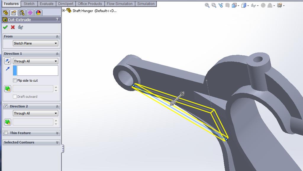 Click and click to exit the sketch mode. Select Features tab and click Extruded Cut. Pick the section.