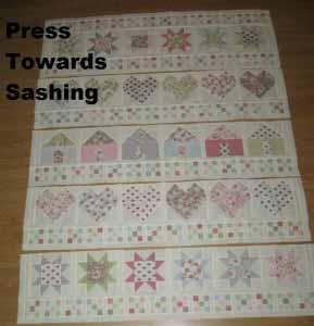 Now, just like making the rows, I just add 1 row at a time to sew the quilt top together.