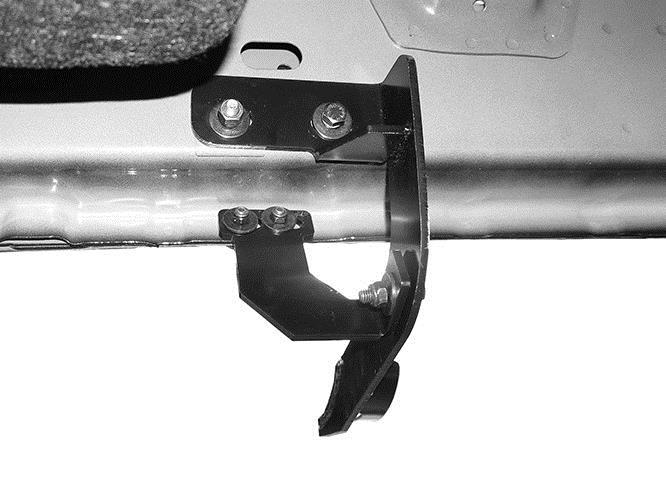 Line up the slots in the top of the Support Bracket with the (2) factory holes in the pinch weld.