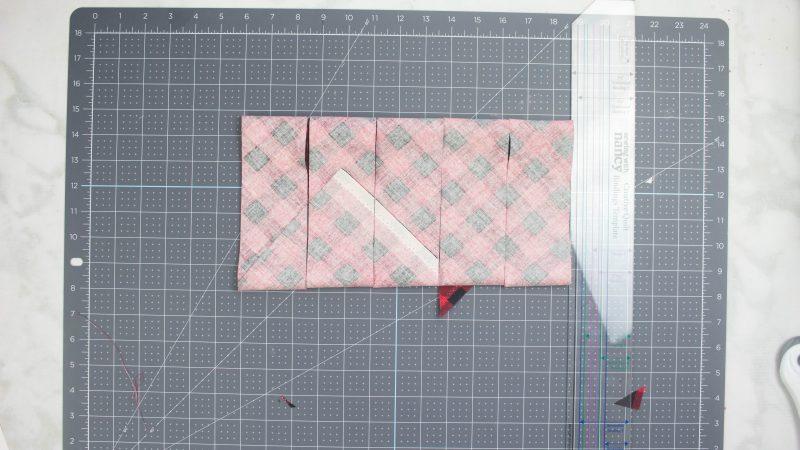 Follow the video in order to cut the fabric into bias tape correctly